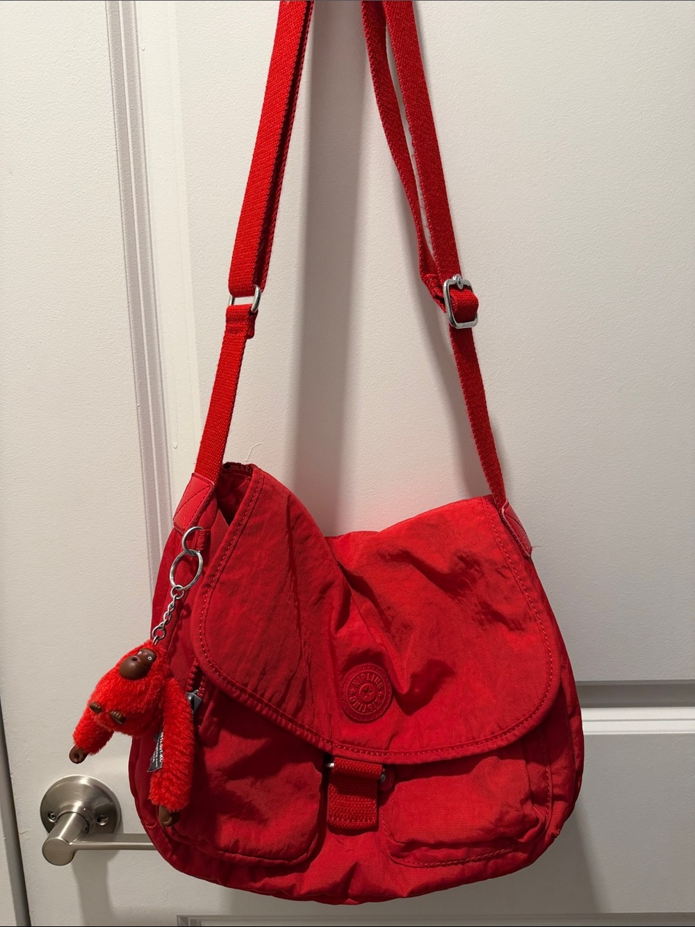 Kipling Bright Red Crossbody Bag with Monkey Charm